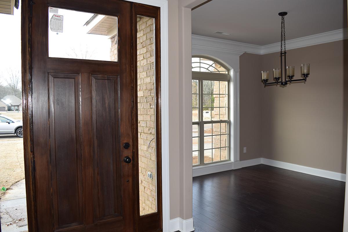 home3woodenfrontdooranddiningroom